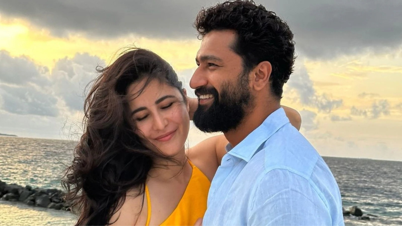 Vicky Kaushal and Katrina Kaif can't stop smiling as they attend the Bad News screening. Watch